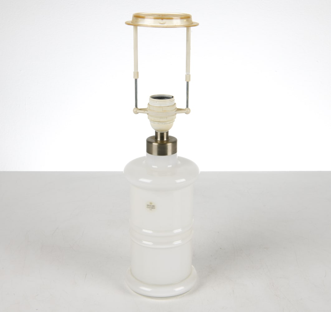HOLMEGAARD DANISH GLASS TABLE LAMP C. 1970'S: Tag on side. Dimensions: H 18" x Dia. 5". Condition: Wiring untested, European plug. Minor scuffs to glass.