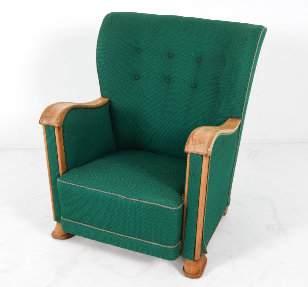 DANISH ART DECO OAK LOUNGE CHAIR C. 1940'S: Dimensions: H 34" x W 28.75" x D 28.5" x SH 13". Condition: Some fraying to fabric trim. Rubbing to arms. Wear consistent with age and use. B095