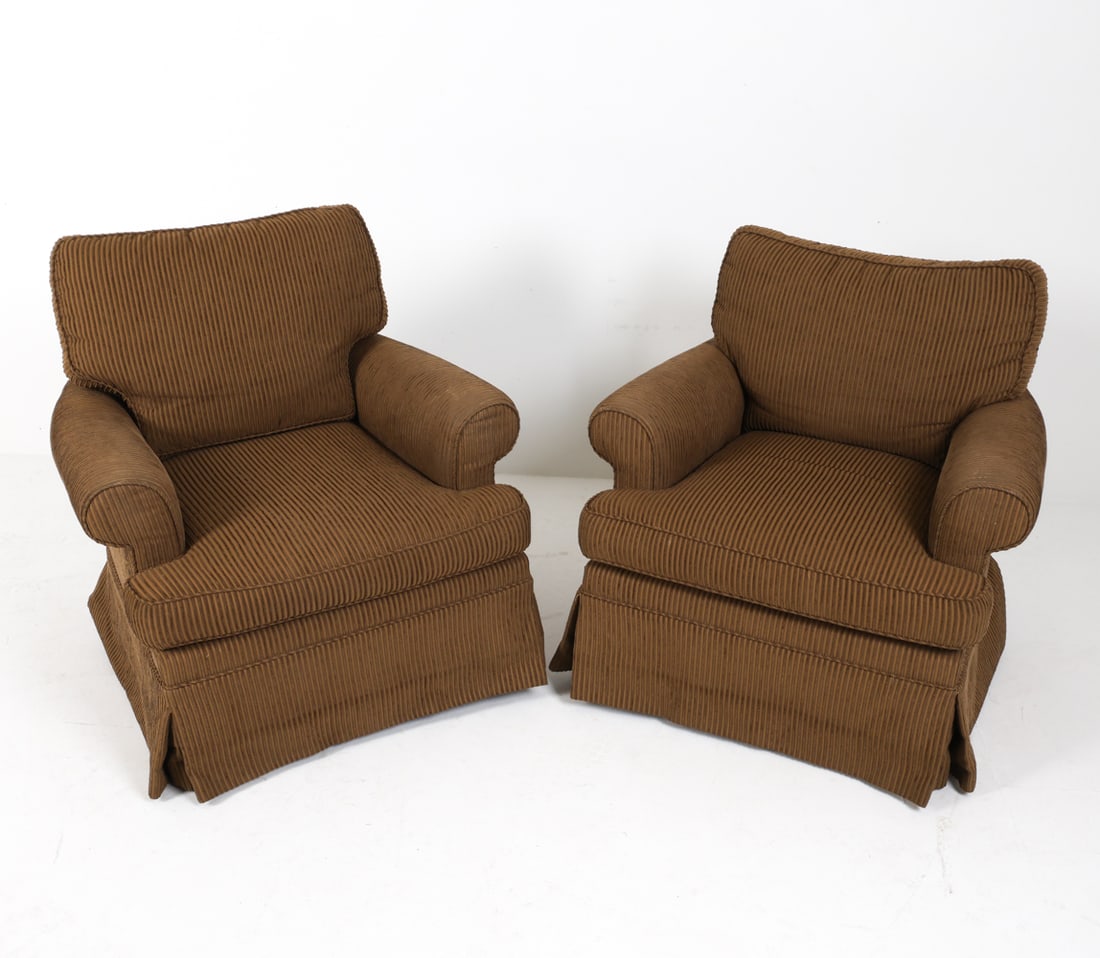 PAIR OF CONTEMPORARY SWIVEL LOUNGE CHAIRS: Chairs swivel and recline. Dimensions: H 34" x W 33" x D 29" x SH 17.5". Condition: A few small tears in the fabric, rubbing and fading on the arms. Wear consistent with age and use.