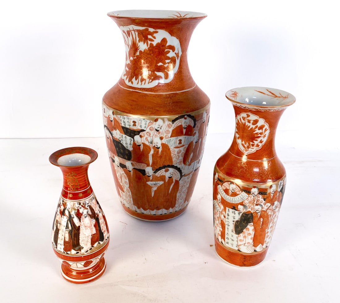 ANTIQUE JAPANESE KUTANI CERAMIC VASE GROUP: Depictions of seals and scholars. Exterior gilt accents. One with underside signature. Dimensions: (largest) H 14" x Dia 7". Condition: Rubbing and marks on exterior paint. Minor scuffs and nicks on r