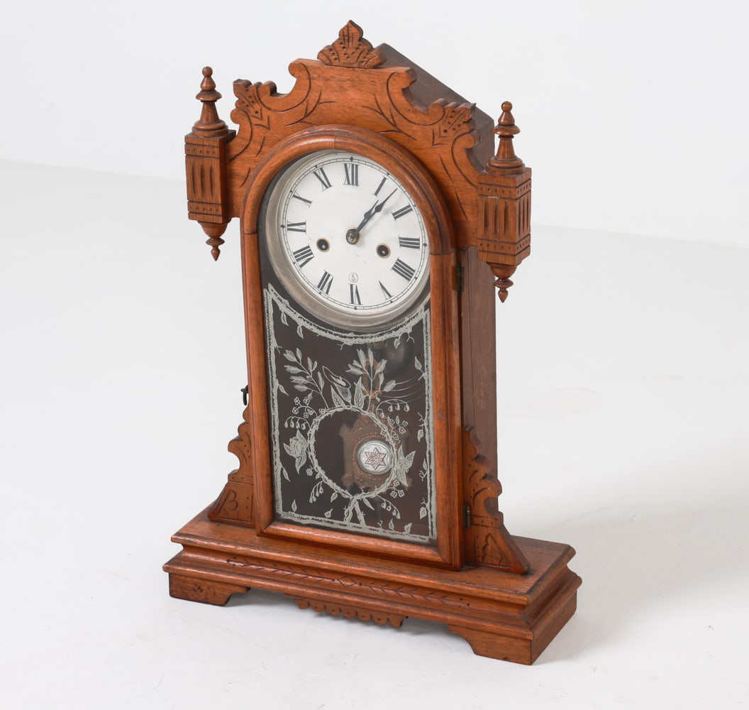 OAK MANTEL CLOCK: Paper dial signed 'SEJ'. Dimensions: H 20.5" x W 13.25" x D 4.5". Condition: Few light scuffs to face. Movement untested. Minor dings and scratches to wood. Wear consistent with age and use.