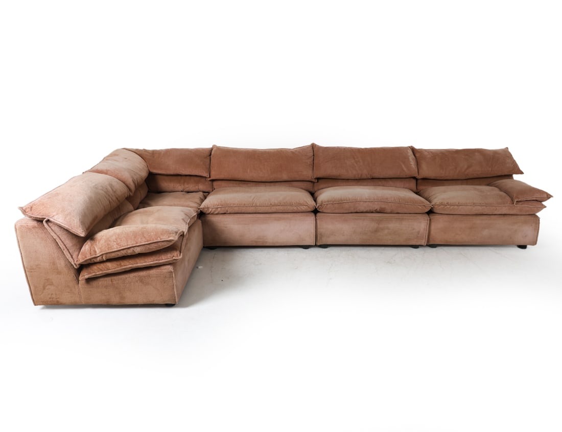 NIELS EILERSEN DANISH SECTIONAL SOFA C. 1970S: This modular sofa set, marked 'N. Eilersen Made in Denmark' on the underside, includes (5) pieces with (1) corner piece. soft brown fabric upholstery. Dimensions: As displayed W 145" x D 73". (Individ