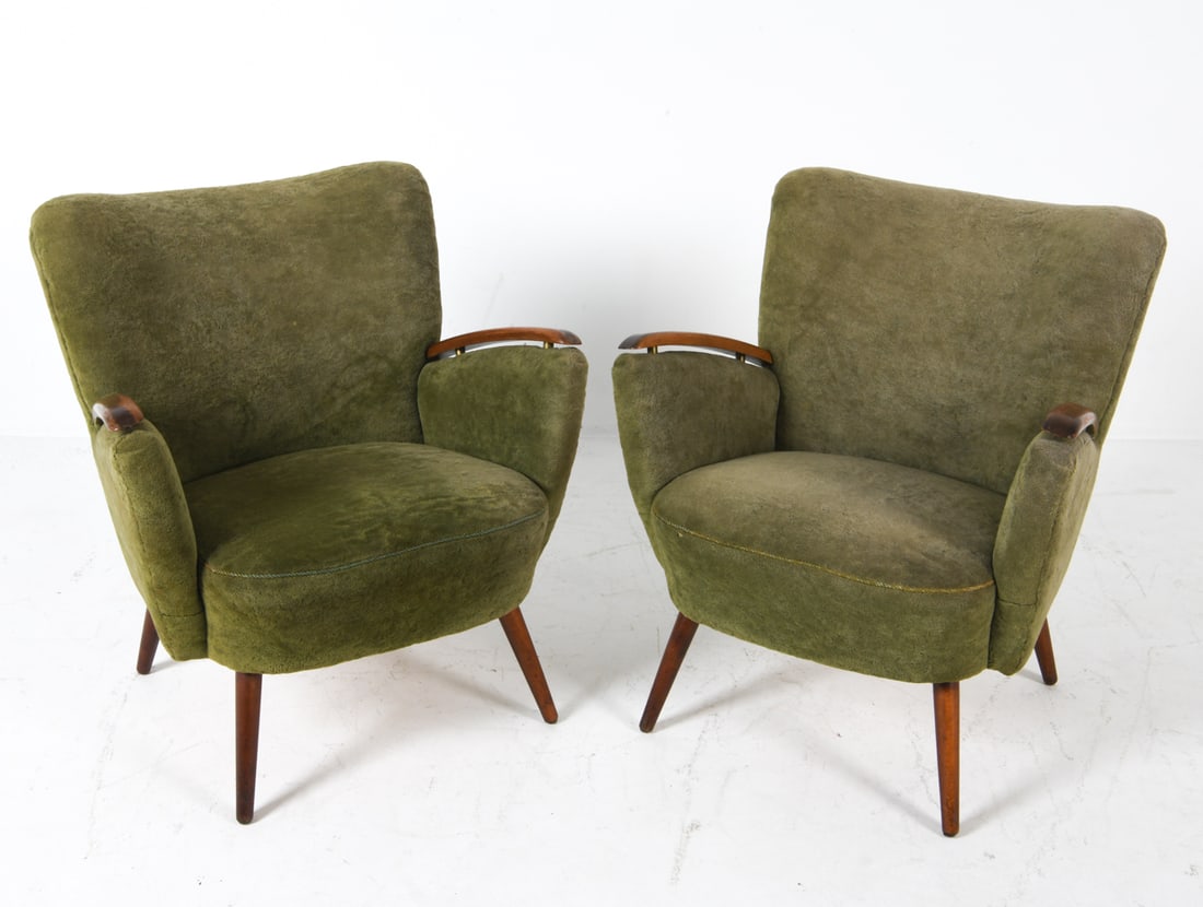 PAIR OF DANISH BEECH COCKTAIL CHAIRS 1960S: Beech legs and arms with brass pegs lifting arms into 'floating' position. Green velour fabric upholstery. Dimensions: H 31.5" x W 27.5" x D 22" x SH 15.5". Condition: Evident rubbing and fading to ar
