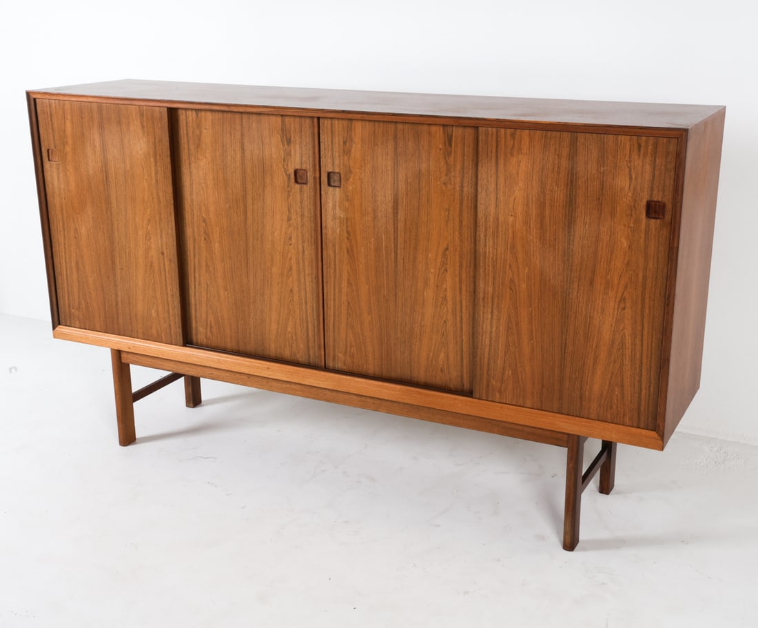 DANISH ROSEWOOD SIDEBOARD C. 1960S: Dimensions: H 45.5" x W 78.75" x D 18.5". Condition: Sun fading, Darker discolored spots on top, few light water rings. Few light surface scratches on top. DMN130