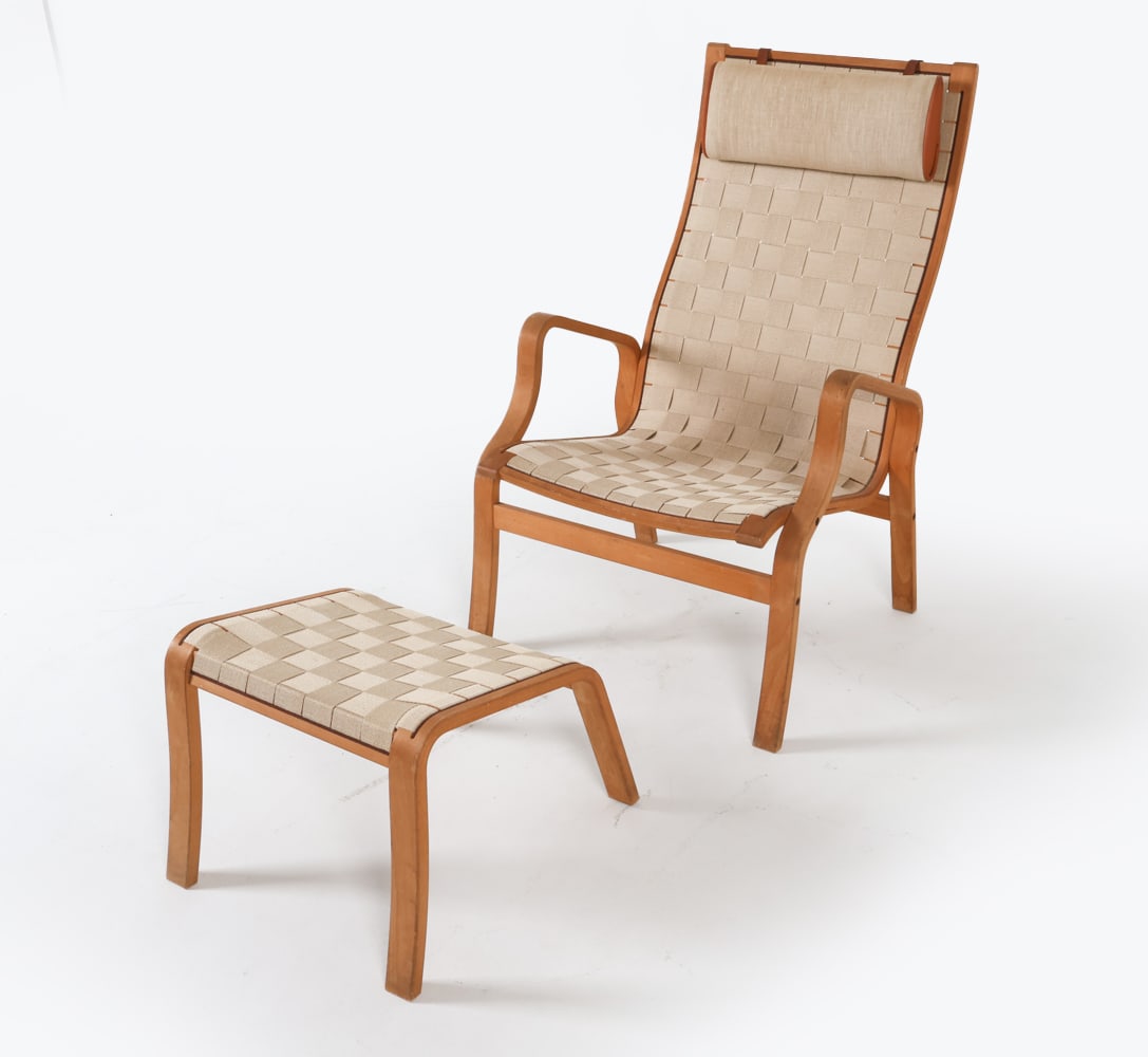 FINN OSTERGAARD BEECH LOUNGE CHAIR W/ OTTOMAN: Beech bentwood frame with canvas webbing upholstery. Together with matching ottoman. Sweden, circa 1960's. Dimensions: Chair 30.5" x W 24.75" x D 25.25" x SH 15". Ottoman H 14.5" x W 17.5" x D 15.5". 
