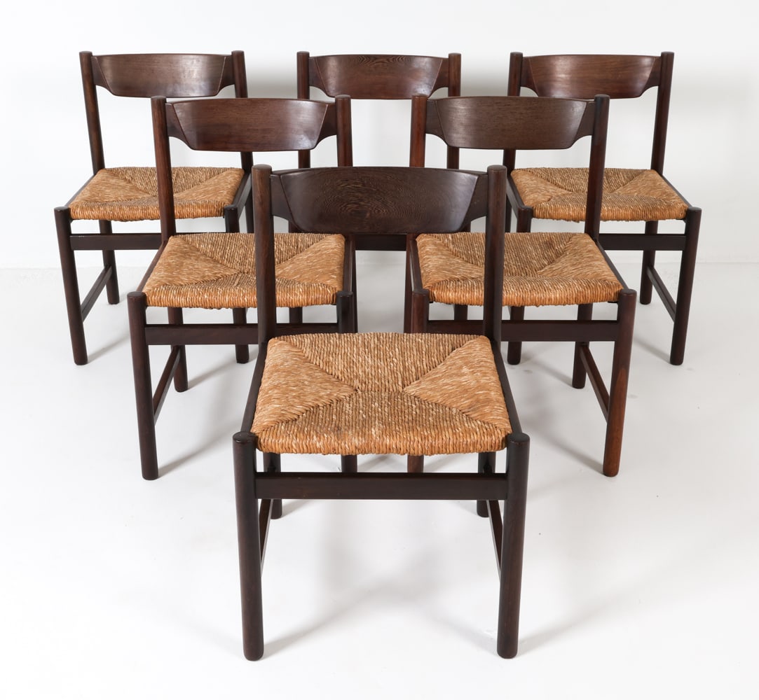 (6) CEES BRAAKMAN RUSH SEAT DINING CHAIRS C. 1960S: Oak frames with rush seats. Dimensions: H 30.5" x W 19" x D 18.5", SH 17.5" Condition: Rush seats show minor discoloration. Wear consistent with age and use. PL062