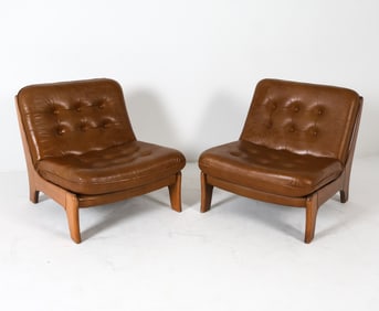 PAIR OF FINNISH OAK AND LEATHER LOUNGE CHAIRS