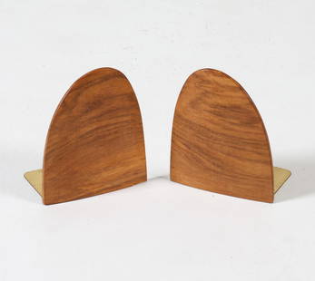 PAIR OF POUL CADOVIUS WALNUT & BRASS BOOKENDS: Denmark, circa 1960s. Dimensions: H 6.5" x W 5.25" x D 3.5". Condition: Few light scuffs to brass, wear consistent with age and use. PL138