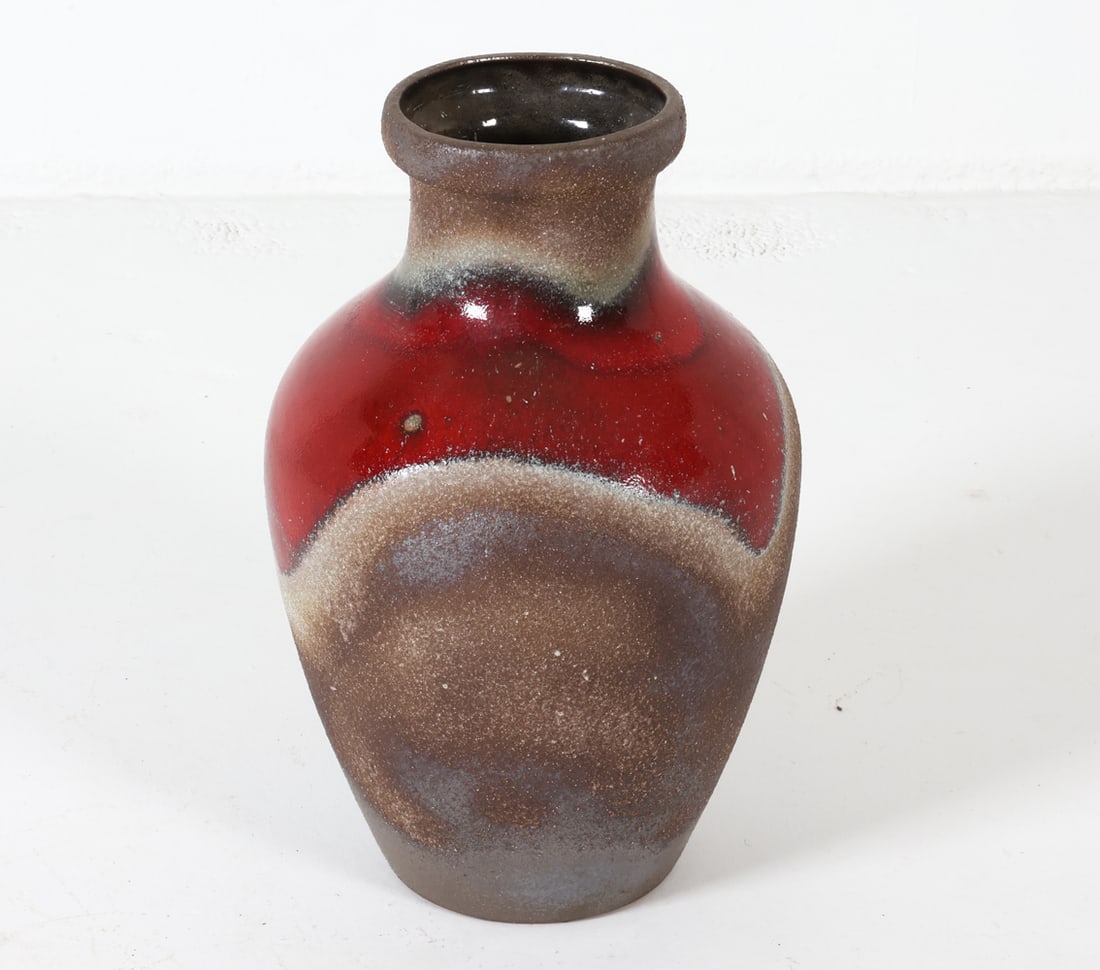 WEST GERMAN ART POTTERY VASE C. 1970S: Showcases a textured surface with the red band being smooth. Dimensions: H 18" x Dia 11" Condition: Minor scuffs to the underside. Presents well overall. PL213