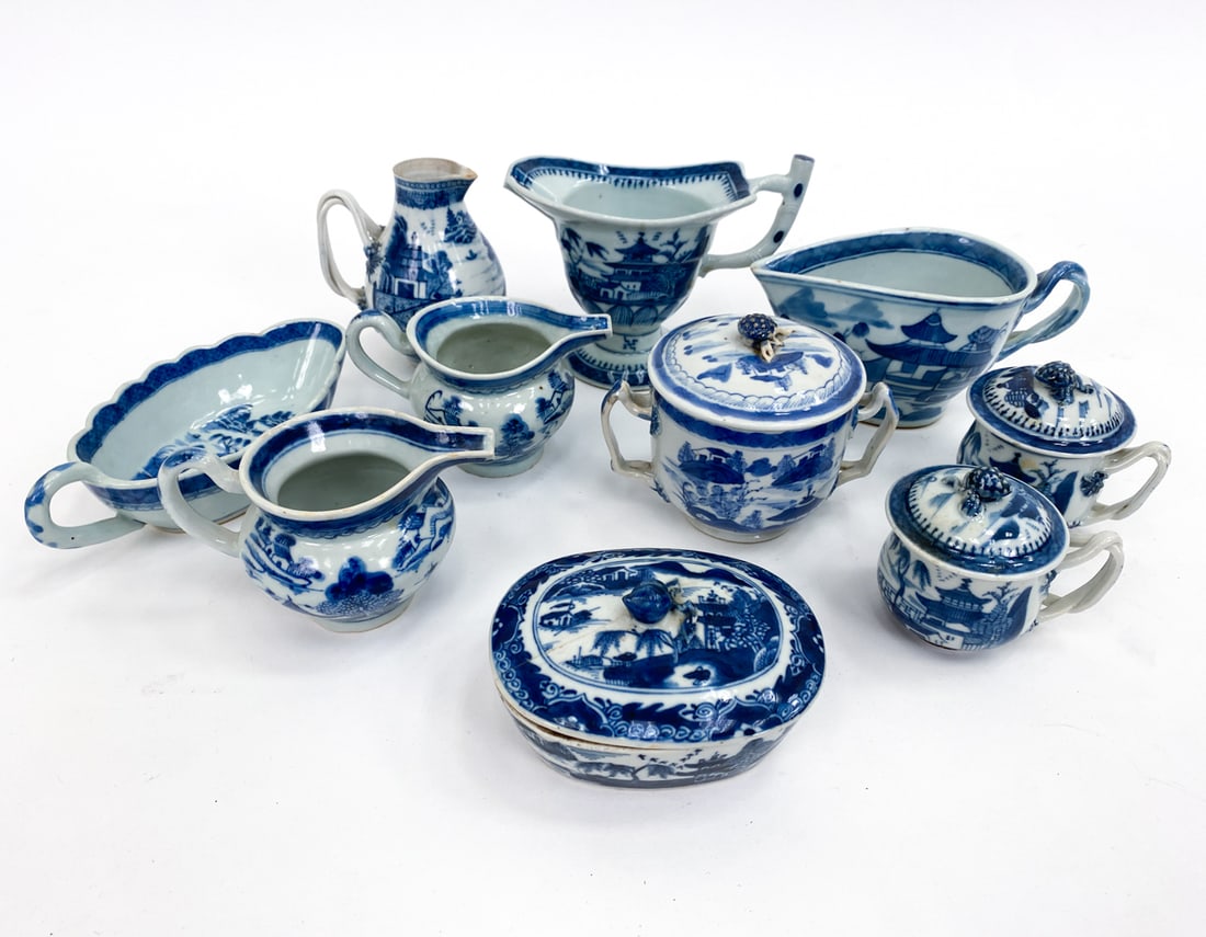 GROUPING OF CHINESE BLUE & WHITE PORCELAIN: Grouping of Chinese tea porcelain including (9) sugar/creamers, and one lidded dish. Dimensions: (Largest) H 5" x W 3.5" x D 6.5" Condition: Glaze flaws, handling marks, a couple small nicks to rims, 