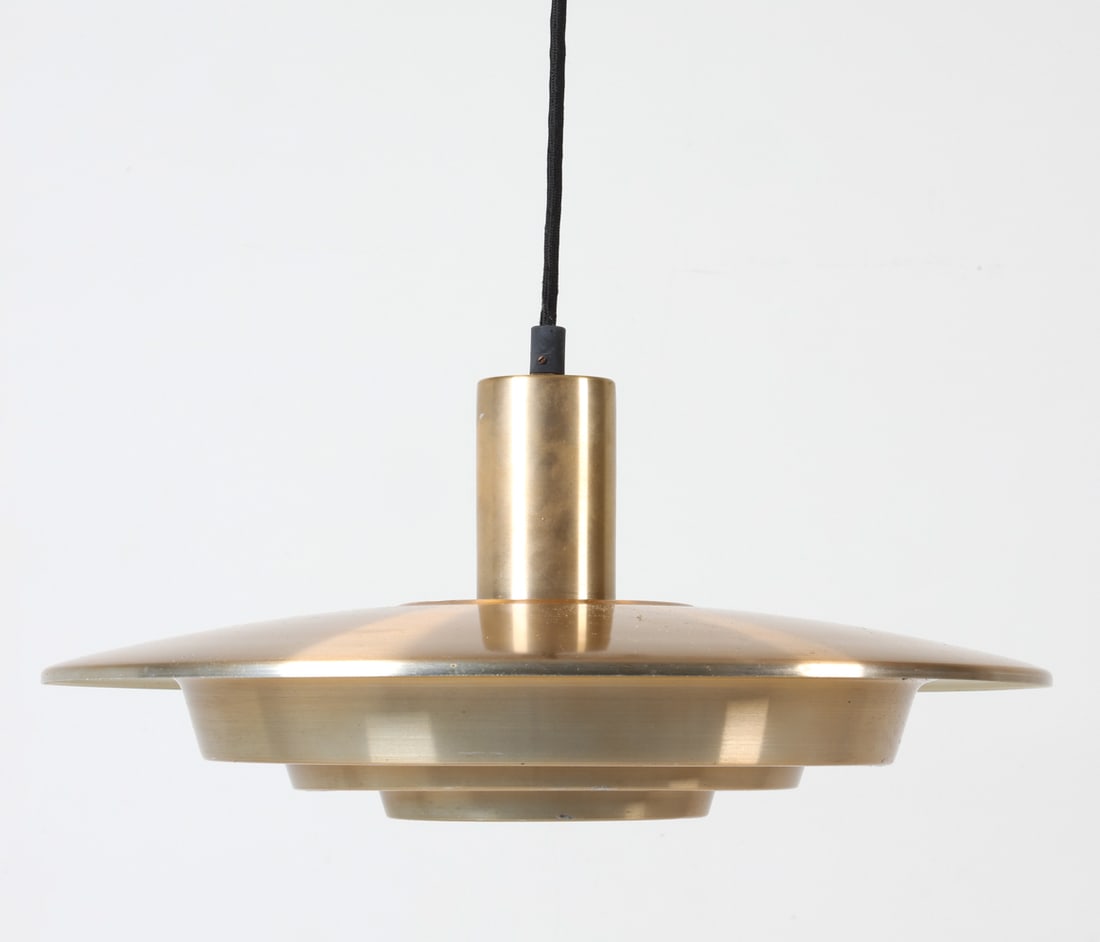 DANISH ALUMINUM PENDANT LIGHT C. 1960S: Designed in the style of Nordisk Solar. Dimensions: H 7.5" x Dia 15.5" Condition: Aluminum surface shows scattered marks and light scratches. Includes untested wire. Wear is consistent with age and us