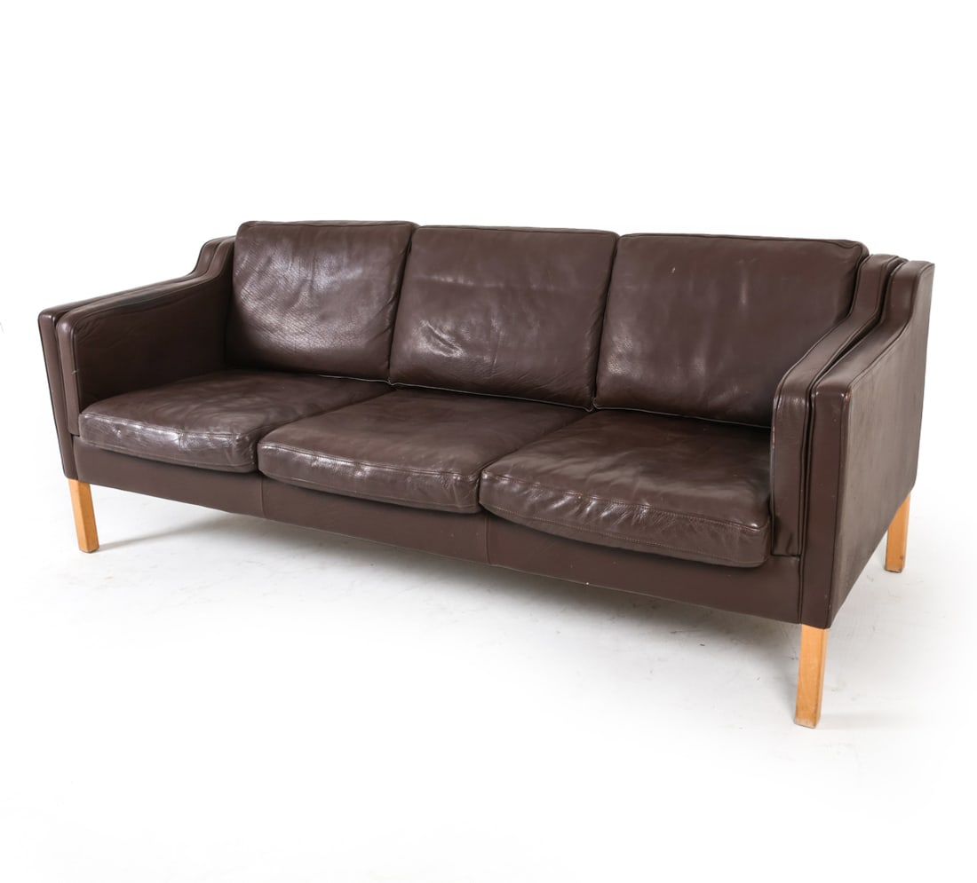 MOGENSEN STYLE DANISH LEATHER SOFA C. 1960S: Dimensions: H 29.5" x W 80" x D 32" x SH 18". Condition: Minor scuffs and rubs to leather and legs. Some paint marks to leather underneath front lower edge. Wear consistent with age and use. D031