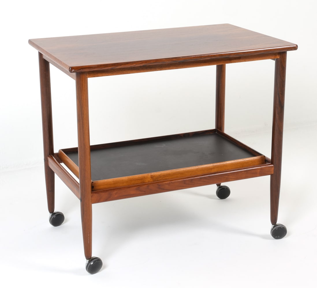 DANISH ROSEWOOD ROLLING BAR CART C. 1960S: Removable tray on lower shelf. Dimensions: H 25" x W 27.75" x D 17.25". Condition: Some sun fading to top, light surface scratches. Wear consistent with age and use. DMO059