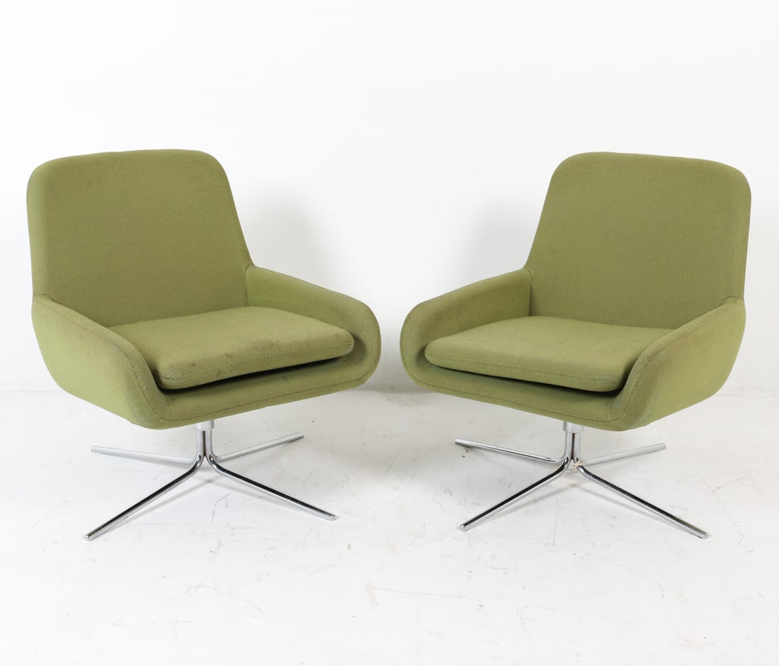 PAIR OF SOFTLINE 'COCO' SWIVEL LOUNGE CHAIRS: Danish. Designed by Busk & Hertzog for SoftLine. Green wool upholstery equipped with chrome swivel bases. Dimensions: H 30" x W 25" x D 23", SH 15.5" Condition: Seat cushions and back upholstery have 