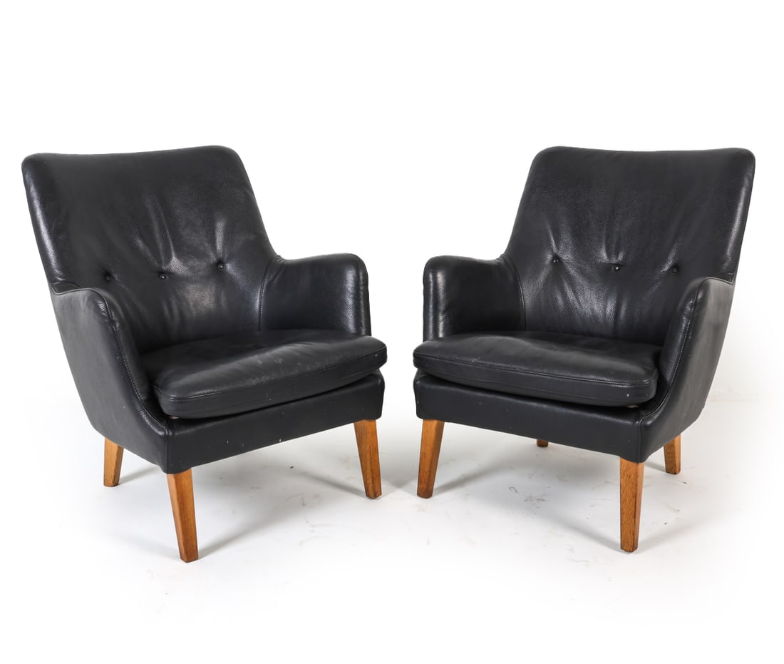 ARNE VODDER NIELAUS AV 53 LEATHER LOUNGE CHAIRS: Labeled to sides. Upholstered in black leather. Danish, circa 1960s. Dimensions: H 32.75" x W 28" x D 21", SH 16" Condition: Legs have scattered marks and discoloration. Upholstery has slight indentat