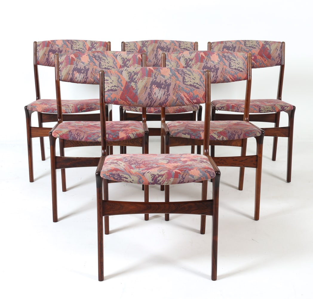 (6) NOVA DANISH ROSEWOOD DINING CHAIRS C. 1960S: Tags under seats. Dimensions: H 31" x W 19.25" x D 16.5" x SH 17.5". Condition: Few scuffs and scratches to wood. Wear consistent with age and use. DMO072