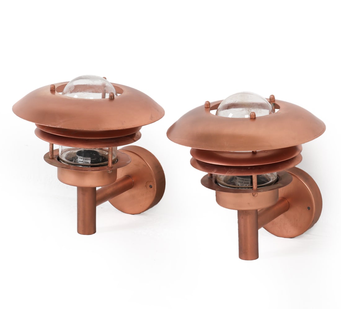 PAIR OF LIGHT STUDIO BY HORN OUTDOOR SCONCES: Copper finish metal with glass shades. Denmark, circa 1970s. Dimensions: H 10.5" x Dia. 10" x D 12". Condition: Wiring untested. Scuffs and scratches to metal and glass. Wear consistent with age and o