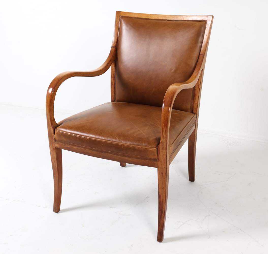 FRITZ HANSEN DANISH LEATHER LOUNGE CHAIR C. 1960S: Apparently unsigned. Dimensions; H 33.75" x W 23" x D 21", SH 17" Condition: Moderate rubbing to frame finish. Slight blemish to seat. Creases on leather. Wear consistent with age and use. GCD021