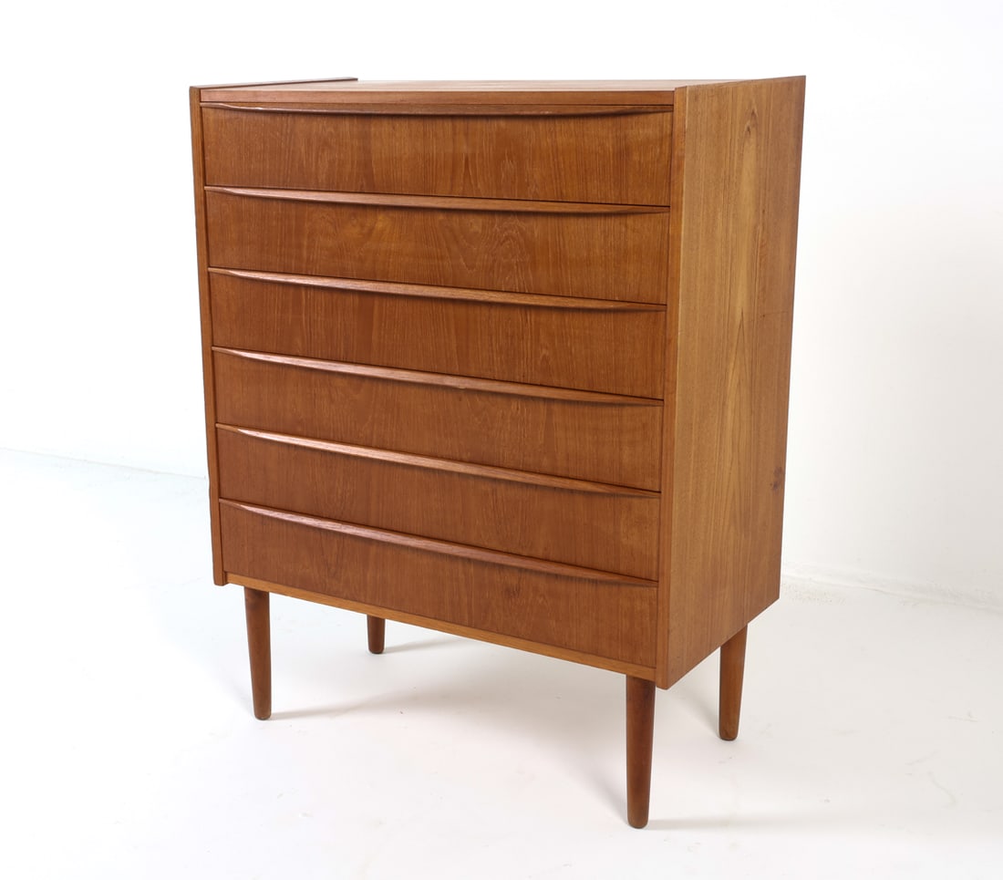 DANISH TEAK CHEST OF DRAWERS C. 1960S: Dimensions: H 40.5" x W 31.25" x D 16.5". Condition: Minor fading, few small dings. Wear consistent with age and use. GCD199