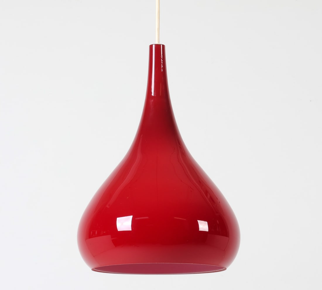 MID-CENTURY DANISH RED GLASS PENDANT LIGHT: Circa 1970s Dimensions: H 12.5" x Dia 9" Condition: Glass has minor scratches to exterior. Untested. Presents well overall.