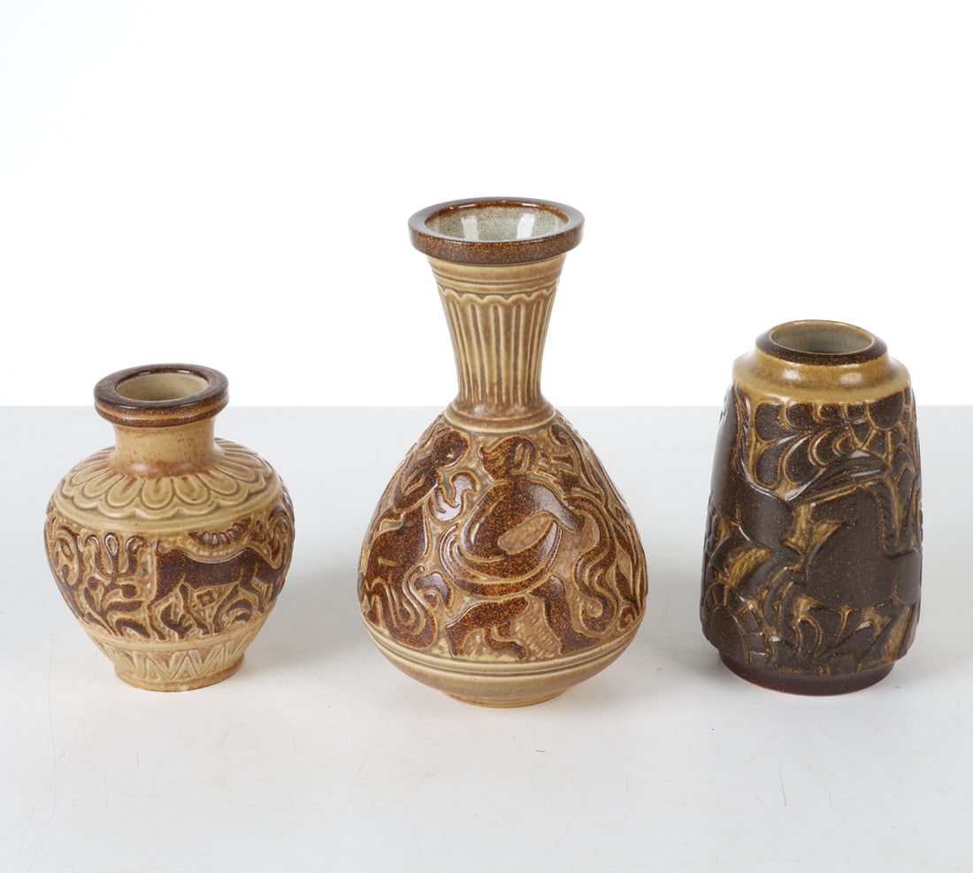 MICHAEL ANDERSEN BORNHOLM DANISH CERAMIC VASES: 3 in total. All marked to undersides. Dimensions: (largest) H 9" x Dia 5" Condition: Smallest vase has minor nicks and loss to glaze. Presents well overall.