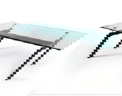LC6 CASSINA DINING TABLE: Marked to base. Dimensions: H 28.5" x W 88.25" x D 33.5" Condition: Scattered scratches and marks to glass. Wear consistent with age and use.