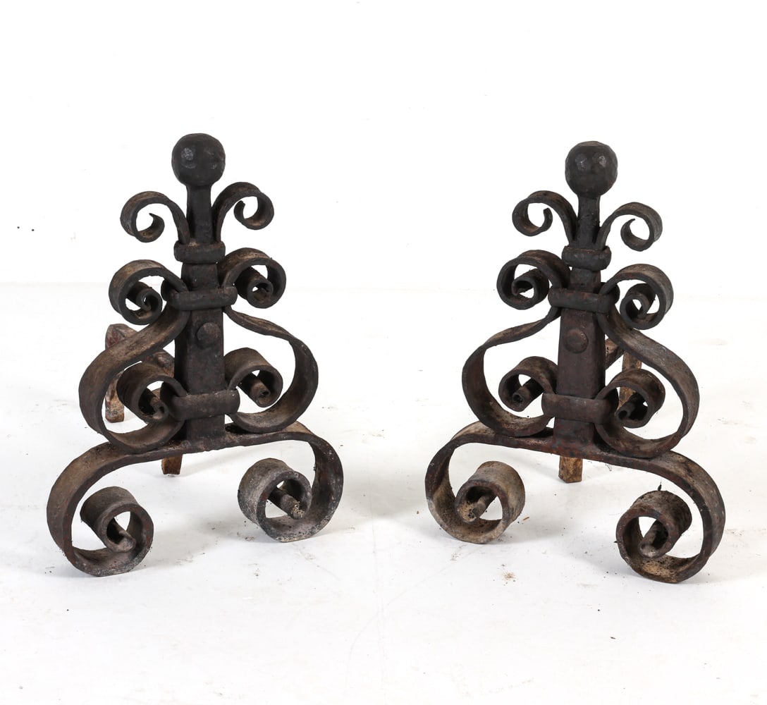 ANTIQUE IRON ANDIRONS: 19th Century. Dimensions: H 18" x W 12.5" x D 17.5" Condition: Moderate oxidation and soiling. Wear consistent with age and use.
