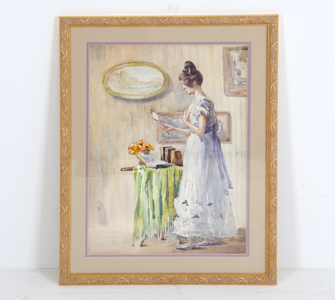 EARLY 20TH C. WATERCOLOR OF A LADY: Watercolor on paper. Depicting a woman looking in to a hand mirror, with an open book on the table. Dimensions: Frame: H 22.25" x W 18". Sight: H 17.25" x W 12.75". Condition: There is a crease to wat