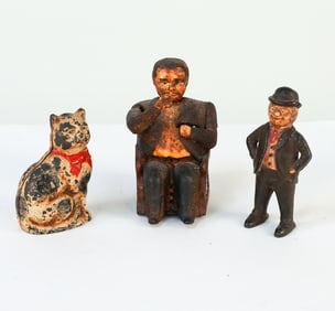GORUPING OF ANTIQUE IRON COIN BANKS