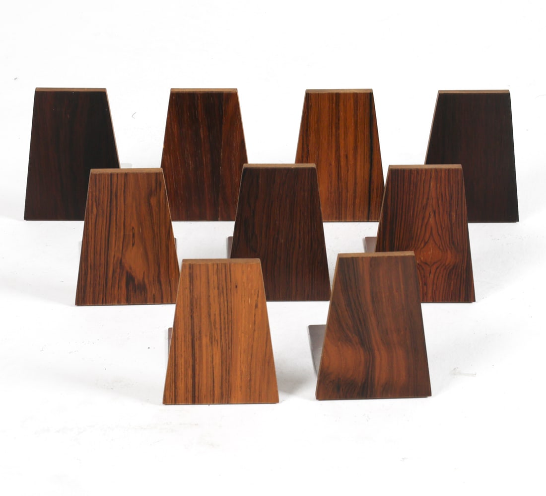 KAI KRISTIANSEN DANISH ROSEWOOD BOOKENDS C. 1960S: Dimensions: H 4.75" x W 3.75" x D 4.25". Condition: Few small dings and scratches to wood and metal. Some wooden pieces are loose on stands. Wear consistent with age and use.