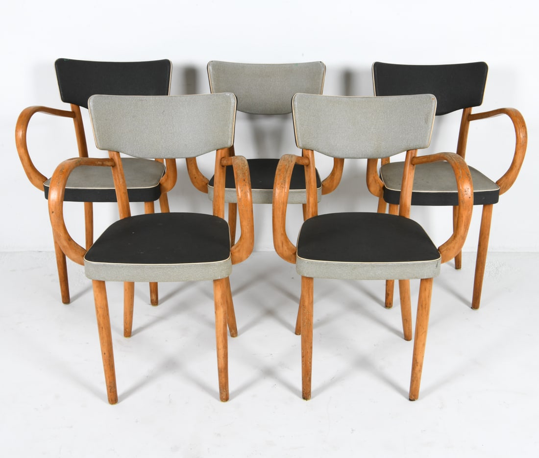 (5) DANISH BENT OAK DINING ARMCHAIRS C. 1960S: Oak frames with dual toned vinyl upholstery. Dimensions: H 34" x W 21" x D 17.5" x SH 19". Condition: Rubbing and sun fading to wood throughout with other dings and scratches. Some discolored spotting