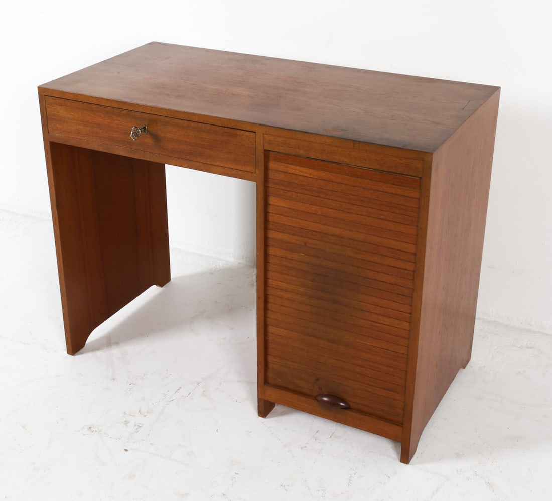 DANISH TEAK TAMBOUR DOOR WRITING DESK C. 1960S: Tambour cabinet door. Dimensions: H 30" x W 37.75" x D 19.75" Condition: Moderate sun fading. Light nicks and scuffs to edges. Wear consistent with age and use.