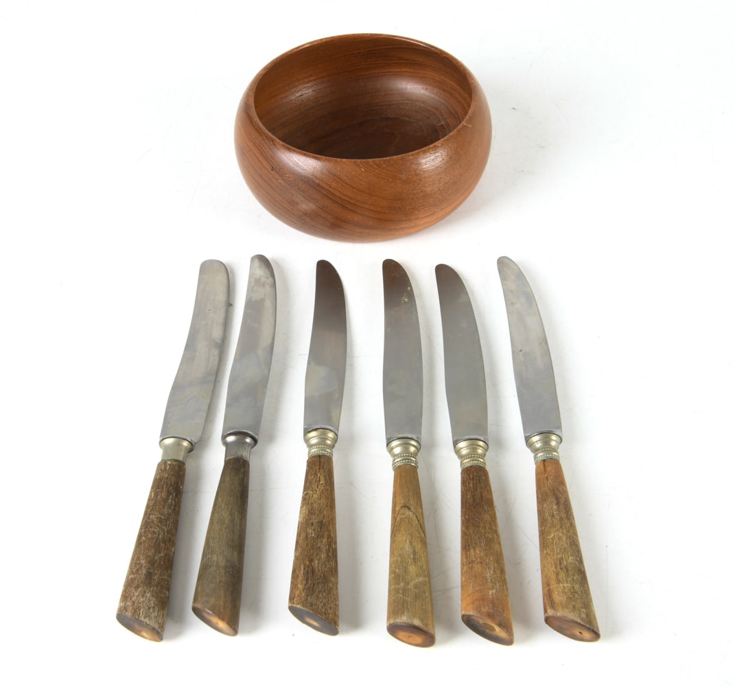MID-CENTURY KNIFE & LONBORG TEAK BOWL GROUPING: Stainless steel blade knives with teak handles. Together with Danish teak bowl, marked Laurids Lonborg under base. Dimensions: Bowl H 2.5" x Dia. 6.25". Knives L 10". Condition: Wooden handles for kni