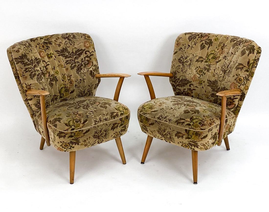 PAIR OF SCANDINAVIAN MID-CENTURY LOUNGE CHAIRS: Pair of armchairs with vintage floral designed fabric. Wood and upholstery. Unmarked. Dimensions: H 30.5" x W 24.5" x D 29" x SH 16" Condition: Some rubs and marks to arms, fabric appears to be origin