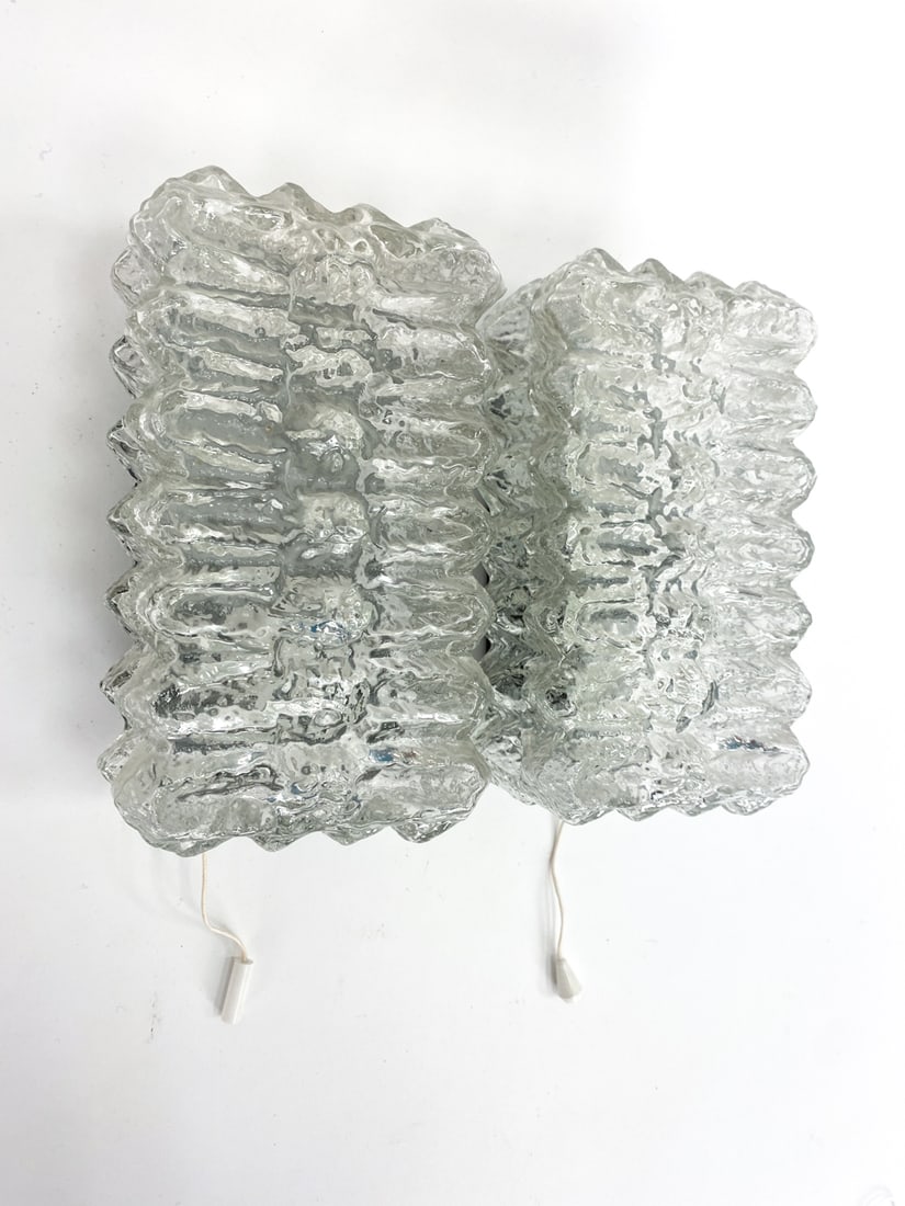 ATTR. DORIA GERMAN ICE GLASS SCONCES: Ice block for glass shades with metal mounts. Apparently unmarked. Circa 1970s. Dimensions: H 7.5" x W 4.25" x D 3.5" Condition: Untested. No issues to glass, couple marks to metal mount. PM088
