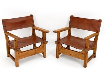 PAIR OF SPANISH STYLE PINE & LEATHER LOUNGE CHAIRS