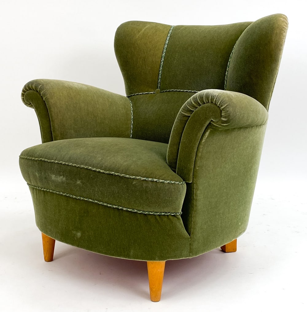 SWEDISH MOHAIR WINGBACK LOUNGE CHAIR, C. 1930S: Green mohair upholstery with oak legs. Apparently unmarked. Dimensions: H 33.5" x W 35" x D 32" x SH 15.5" Condition: Slight fading to upholstery, some rubs and marks to legs. PM038