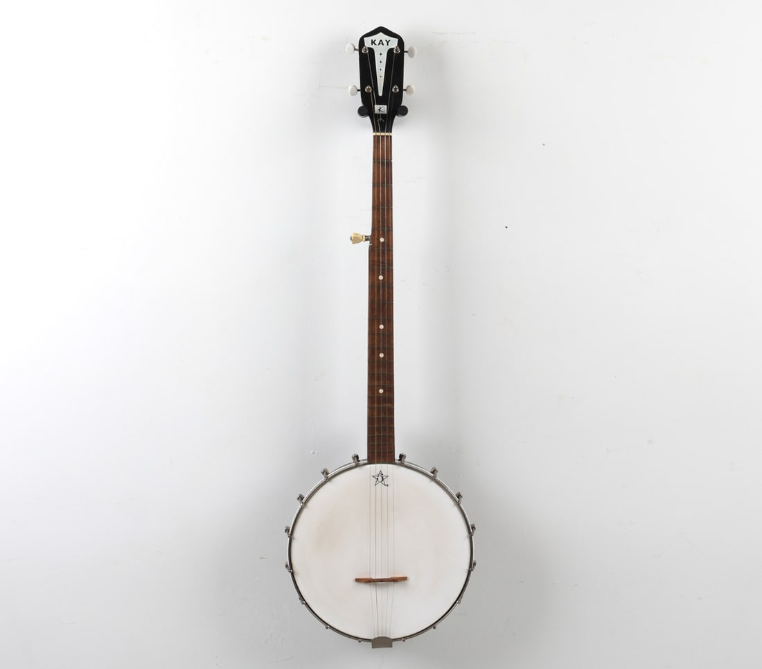 VINTAGE KAY 5-STRING BANJO C. 1960S: Case included. Dimensions: L 38" x W 11.25". Condition: Very minor signs of use, good presentation overall. Scuffs and scratches to edges of wood.