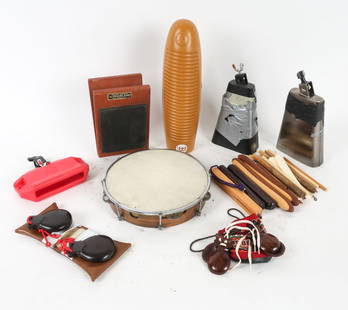 PERCUSSION INSTRUMENT GROUPING: Grouping of mostly vintage, some modern, percussion instruments, useful in studio. Includes vintage tambourine, Pearl cow bell, LP Cow Bell, LP plastic block, Plastic Guiro, vintage Slingerland Niles