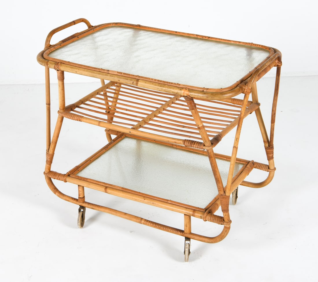 SWEDISH BAMBOO & GLASS BAR CART C. 1960S: Bentwood bamboo frame with textured glass tiered shelves. On brass casters Dimensions: H 25" x W 29" x D 18" Condition: Scattered discoloration to finish. Base has slight wobble. Wear consistent with