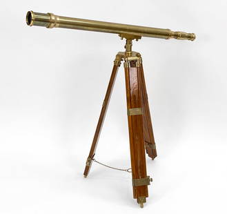STANLEY LONDON 50MM HARBORMASTER TELESCOPE: Telescope made from polished brass and teak. Includes large tripod, scope, and brass scope extender. 20th C. Heavy solid brass casting with a three-legged tripod base able to extend. In original box.