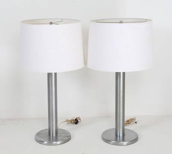 PAIR OF NESSEN BRUSHED ALUMINUM TABLE LAMPS: Contemporary. Dimensions: H 31" x Shades Dia. 16.75". Condition: Wiring untested. Few scuffs, dings, spots of surface soiling to steel. One is missing top finial.