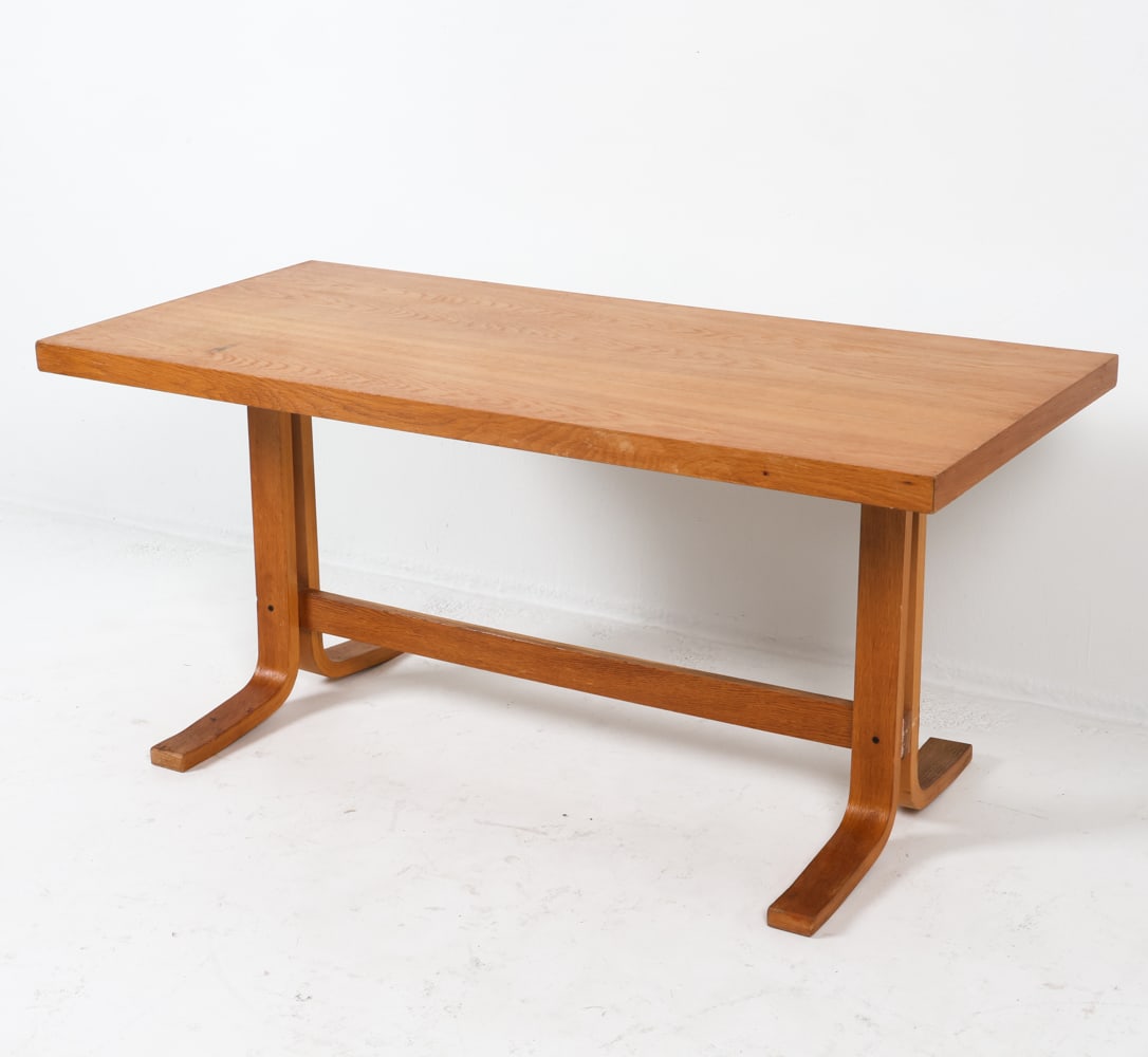 LUDVIK VOLAK FOR DREVOPODNIK HOLESOV OAK TABLE: Czechoslovakia, circa 1960s. Dimensions: H 22" x W 47.5" x D 21.75". Condition: Sun fading to top. Few scuffs and dings. Small discolored spot. Wear consistent with age and use.