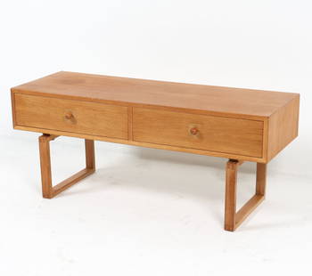 SCANDINAVIAN OAK LOW CHEST C. 1970S: Dimensions: H 16.5" x W 39.25" x D 13.75" Condition: Moderate watermarks. Scuffs and marks, consistent with age and use.