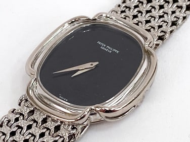 PATEK PHILIPPE ELLIPSE 18K WHITE GOLD WATCH