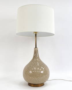 GOURD FORM CERAMIC TABLE LAMP: Glazed ceramic lamp with a teardrop or gourd form. Apparently unmarked. Dimensions: (To finial) H 36" x Dia 17" Condition: Untested. Very light handling marks. No issues to note.