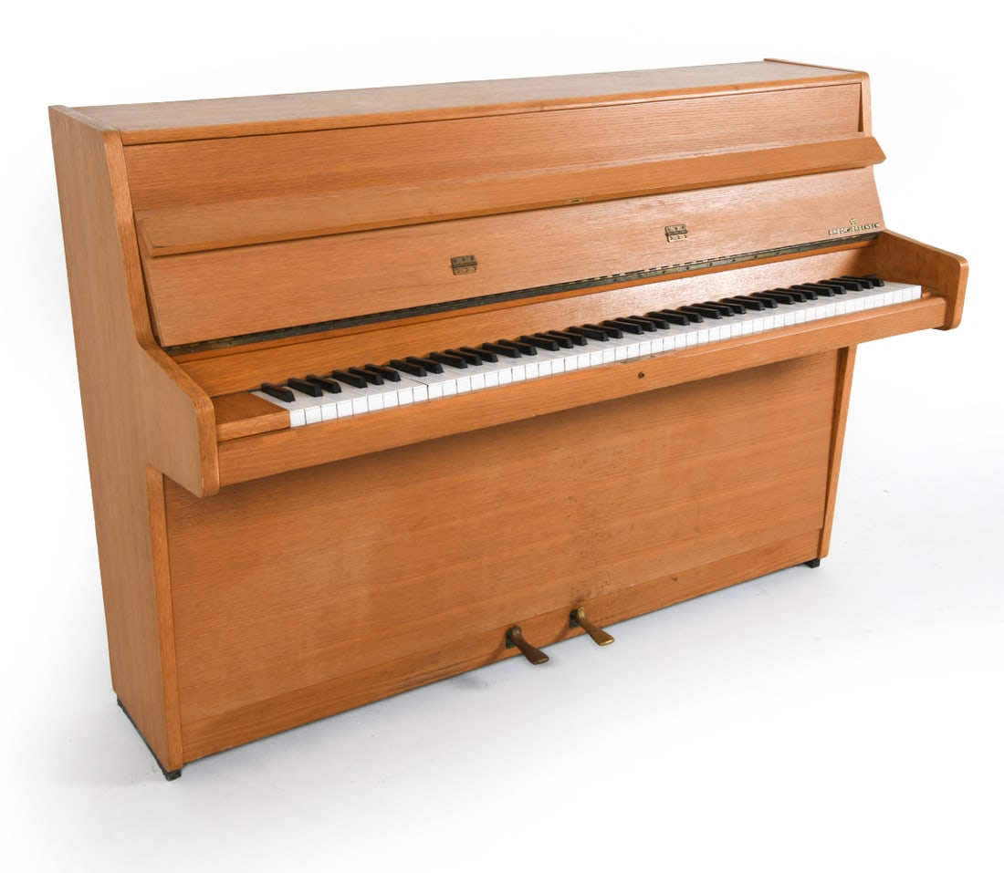 BRODR. JORGENSEN DANISH OAK UPRIGHT PIANO C. 1960S: Marked to interior and fallboard. Stamped with numbers to backside 10078. Dimensions: H 40.5" x W 56.5" x D 21.75" Condition: Scattered nicks and marks. Highest C key sticks. Blemishes to lower panel.