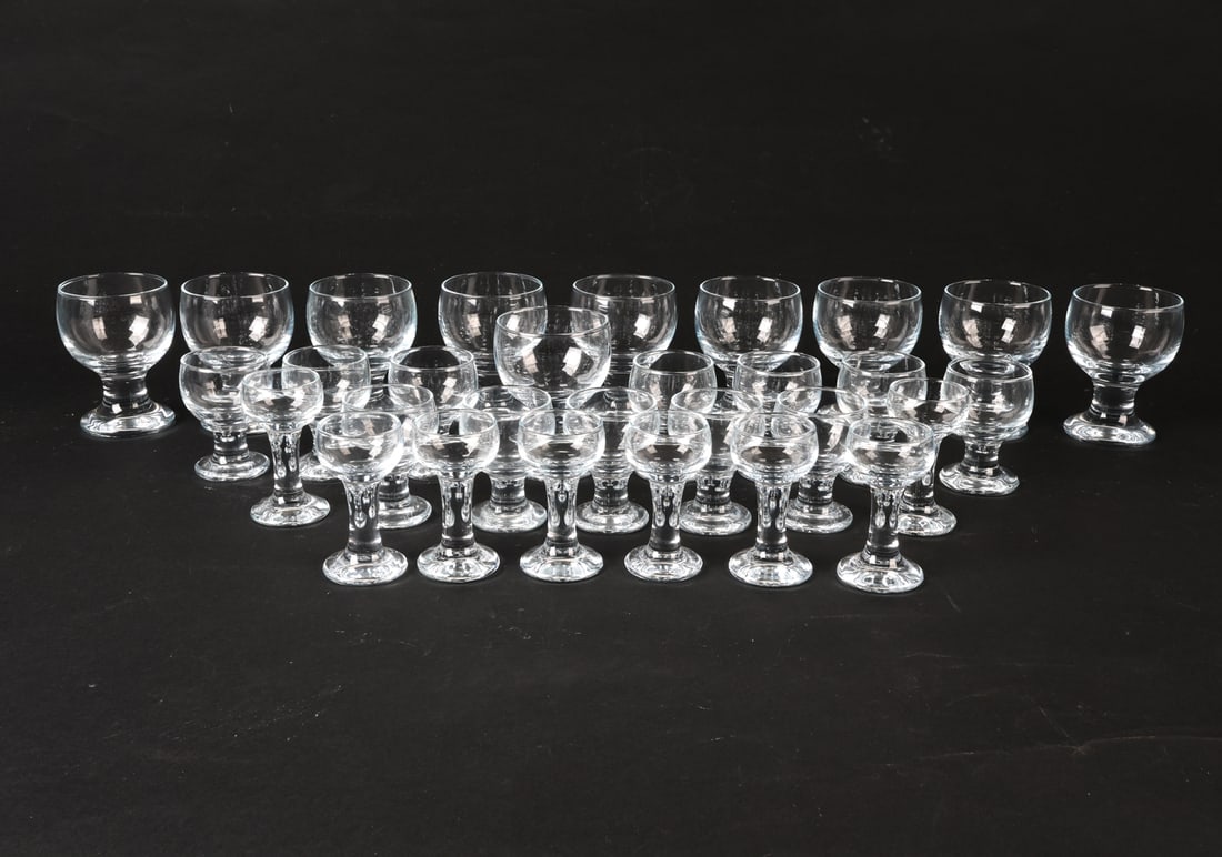 HOLMEGAARD KROGLAS GLASSWARE GROUPING: Includes (30) pieces. Denmark, circa 1970s. Dimensions: Tallest H 5". Condition: Wear consistent with age and use.