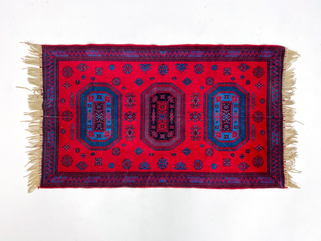 TURKISH PRAYER RUG: Unmarked. Dimensions: L 45" x W 26" Condition: Small areas of fraying, one spot of soiling on underside.