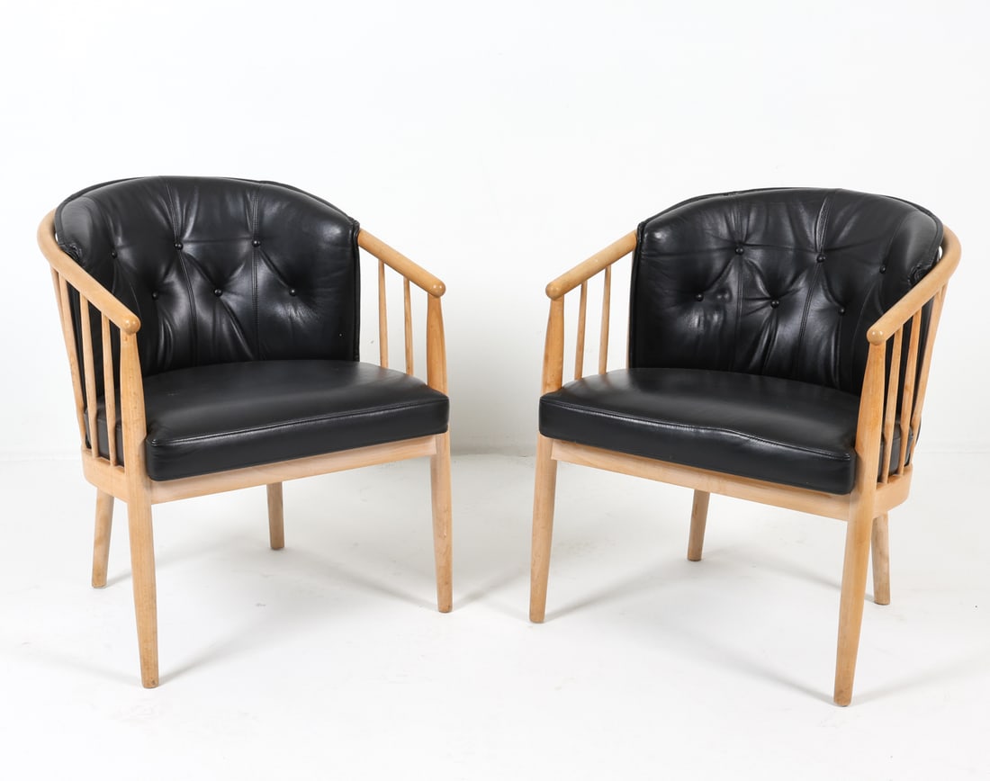 PAIR OF SCANDINAVIAN LEATHER LOUNGE CHAIRS C. 70S: Beech slat frames with black leather cushions. Dimensions: H 30" x W 25" x D 21.5", SH 18" Condition: Moderate blemishes and residue to frames. Wear consistent with age and use. DMP107